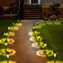 Zestaw 10 solarnych lamp ogrodowych LED - oświetlenie zewnętrzne, ciepła biel, wbijane w ziemię